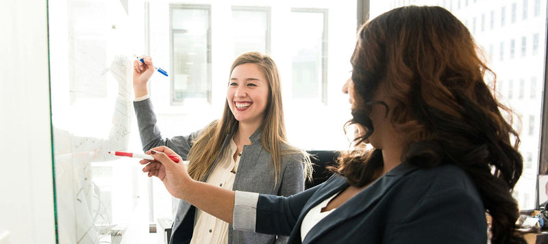 Two Women Managing Business