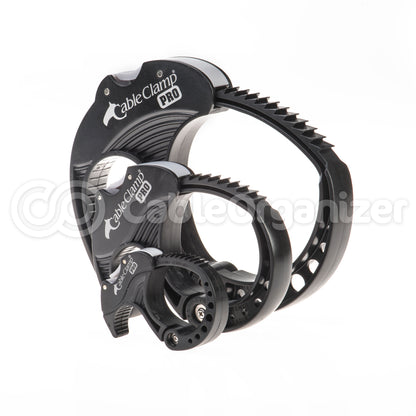 A small, medium, and large black Cable Clamp as a kit.