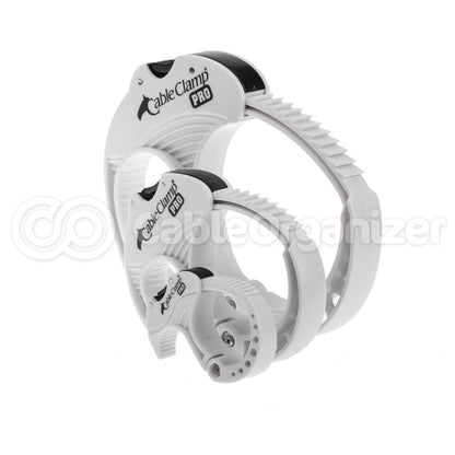 A small, medium, and large white Cable Clamp as a kit.